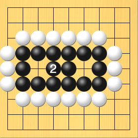 めの中に打った白石を黒が取った図。進行手順、2手目・黒4の5に打って、白3の5の石を取る