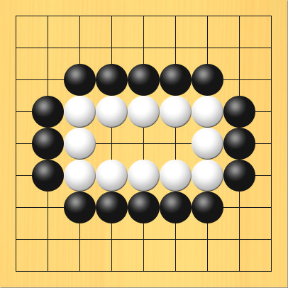 白石が黒に囲まれている図。盤面図、白3の4、白4の4、白5の4、白6の4、白7の4、白7の5、白7の6、白6の6、白5の6、白4の6、白3の6、白3の5。黒3の3、黒4の3、黒5の3、黒6の3、黒7の3、黒8の4、黒8の5、黒8の6、黒7の7、黒6の7、黒5の7、黒4の7、黒3の7、黒2の6、黒2の5、黒2の4